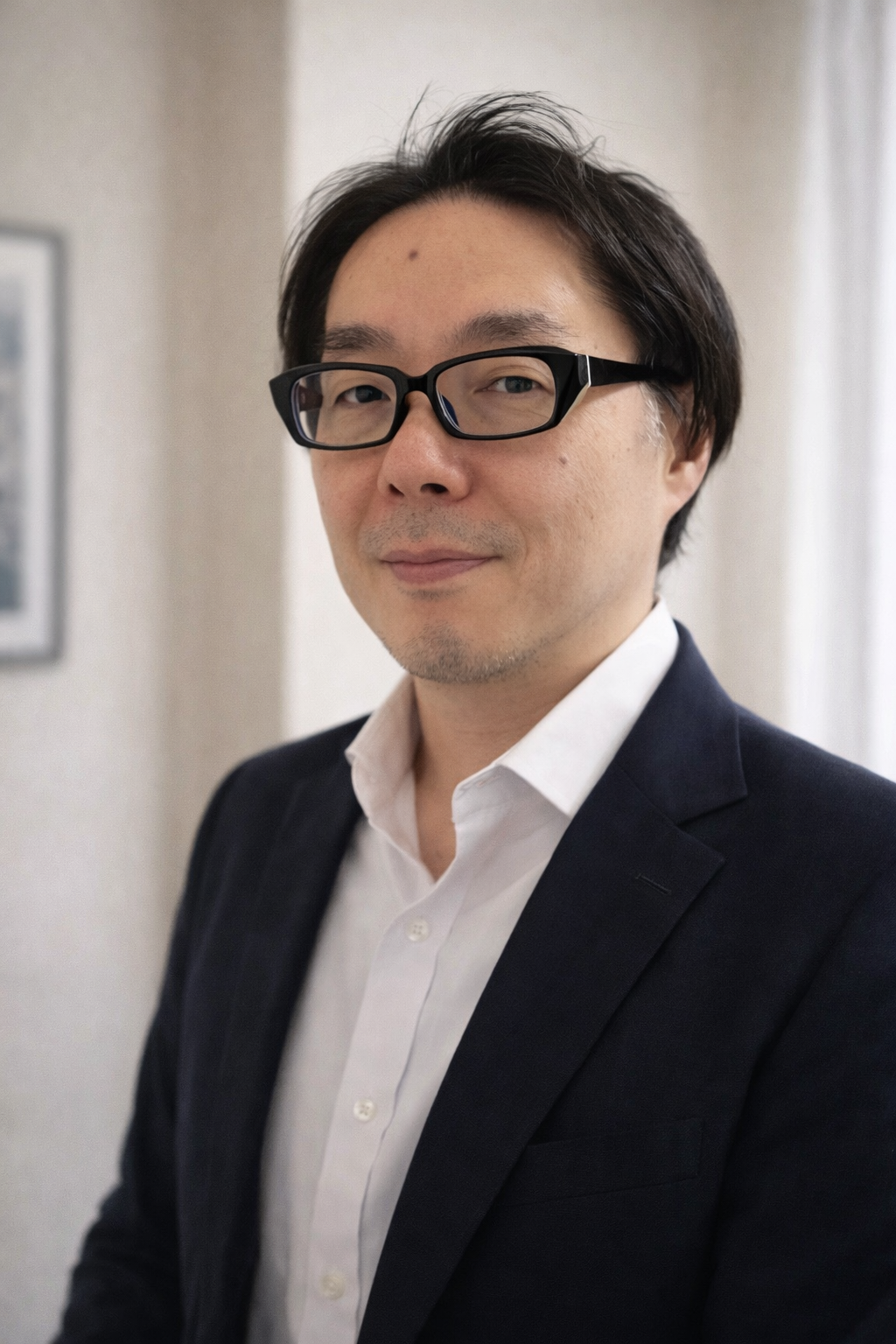 明 豊 氏